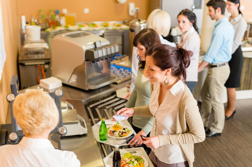 Workers Lining Up to Get Food at Cafeteria