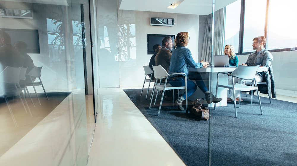 Group of People in Meeting Room